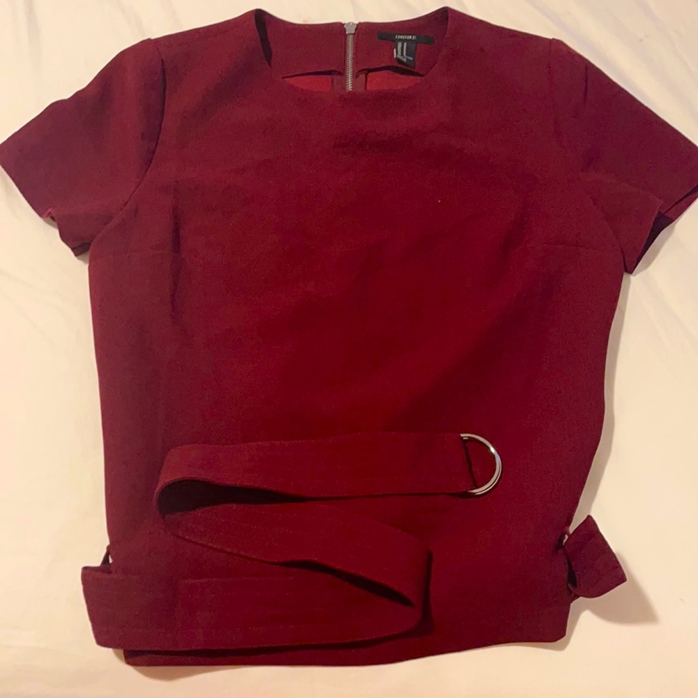 Super cute semi-casual top with a belt. This top is perfect for work. Brand new